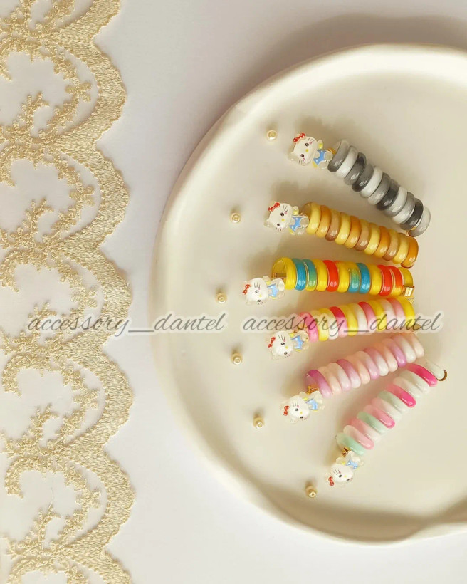 کش موی دخترانه مدل فنری طرح عروسکی کیتی رنگی